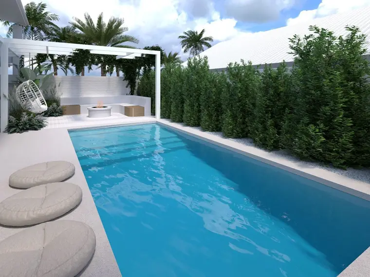 Bay Series pool with splash deck in a landscaped garden