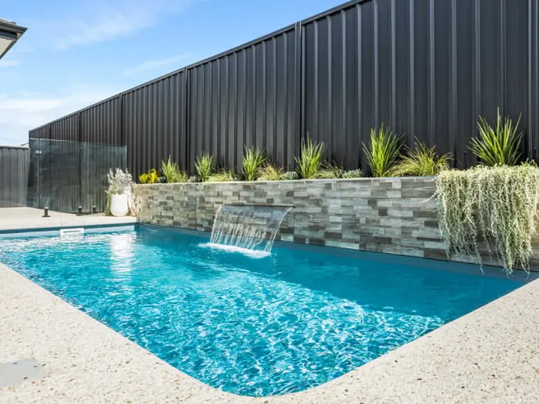 Stradbroke Series slimline pool with a water feature along a narrow backyard